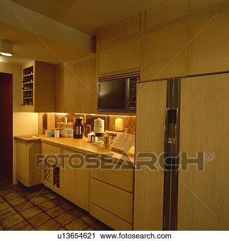 Stock Image - fixed, interior, appliance, refrigerator, fridge, lighting, interiors. Fotosearch