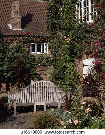 Furniture on patio in country garden in summer View Large Photo Image Stock Photo - Furniture on patio in country garden in summer. Fotosearch