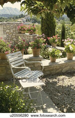 Furniture on patio of house in France View Large Photo Image Stock Image - Furniture on patio of house in France. Fotosearch