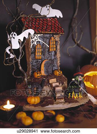Stock Image - Halloween cake and pumpkins.. Fotosearch
