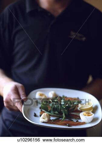 Stock Photograph - hr 671, salmon, restaurant, waiter, fish, food. Fotosearch