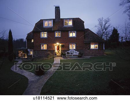 Illuminated country house at Christmas time. View Large Photo Image Stock Image - Illuminated country house at Christmas time.. Fotosearch