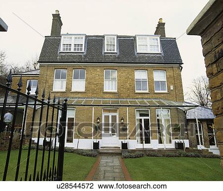 Stock Image - Large detached Victorian town house. Fotosearch