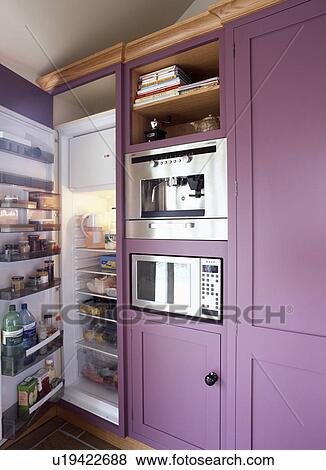 Pictures Of Large Fridge Freezer With Open Door Beside Microwave And Large Fridge Freezer With Open Door Beside Microwave And Oven Built Into Purple Kitchen Cupboard