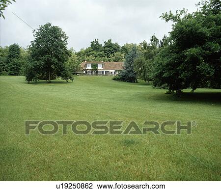 Large lawn in front of country house in summer View Large Photo Image Stock Image - Large lawn in front of country house in summer. Fotosearch