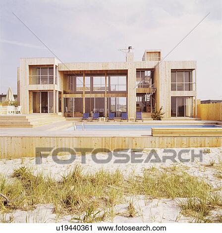 Large modern house with swimming pool View Large Photo Image Stock Image - Large modern house with swimming pool. Fotosearch