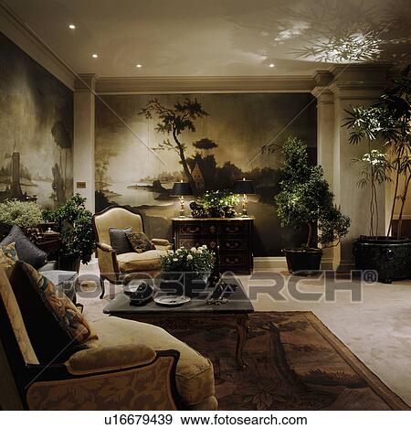 Large murals on walls of neutral living room View Large Photo Image Stock Photo - Large murals on walls of neutral living room. Fotosearch
