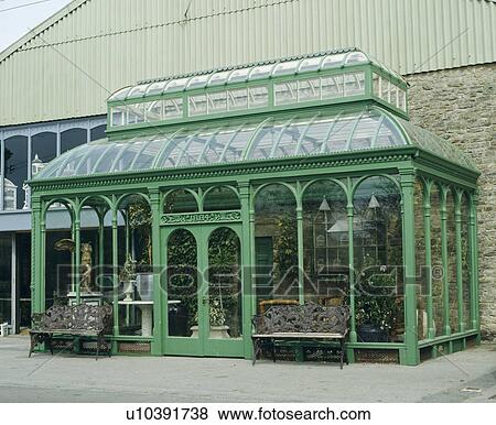 Large Victorian glass conservatory painted green View Large Photo Image Stock Photo - Large Victorian glass conservatory painted green. Fotosearch