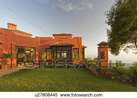 Lawn and orange newbuild villa on hillside in Southern Spain View Large Photo Image Stock Photography - Lawn and orange newbuild villa on hillside in Southern Spain. Fotosearch