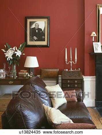 Leather sofa in traditional red living room View Large Photo Image Stock Photography - Leather sofa in traditional red living room. Fotosearch