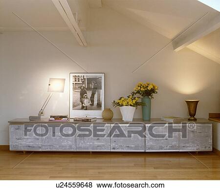 Low grey cupboards used for photographic storage in loft studio. View Large Photo Image Stock Photo - Low grey cupboards used for photographic storage in loft studio.. Fotosearch