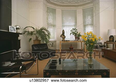 Marcel Breuer Wassily chair in monochromatic sixties living room View Large Photo Image Stock Photo - Marcel Breuer Wassily chair in monochromatic sixties living room. Fotosearch