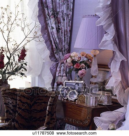 Stock Photo - Mauve lamp on small table. Fotosearch