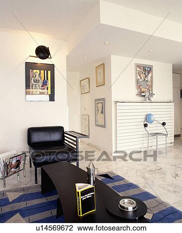 Stock Image - Modern chairs in white modern living room. Fotosearch