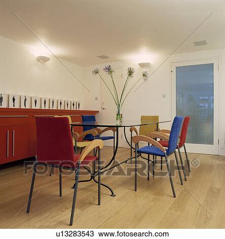 Stock Image - Modern Dining Table with Six Chairs.. Fotosearch