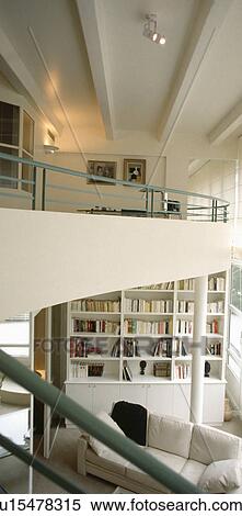 Stock Photography - Modern white double-storey living room. Fotosearch