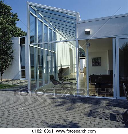 Modern white house in the country with glass extension View Large Photo Image Stock Image - Modern white house in the country with glass extension. Fotosearch