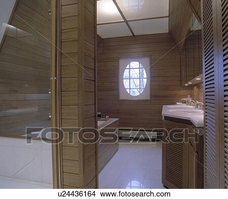 Modern Wood Panelled Bathroom With Opaque Glass Ceiling Panels And