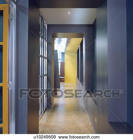 Narrow modern blue hall with polished beige floor View Large Photo Image Stock Photo - Narrow modern blue hall with polished beige floor. Fotosearch