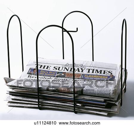 Stock Image - Newspapers stored for recycling. Fotosearch