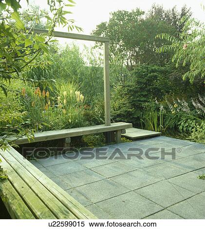 Stock Photography - Paved patio in small town garden. Fotosearch