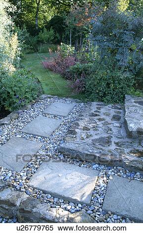 Pebble and stone paving in country garden in summer View Large Photo Image Stock Photography - Pebble and stone paving in country garden in summer. Fotosearch