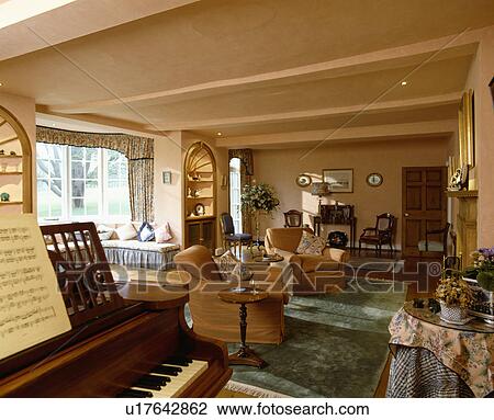 Piano in traditional living room View Large Photo Image Stock Image - Piano in traditional living room. Fotosearch