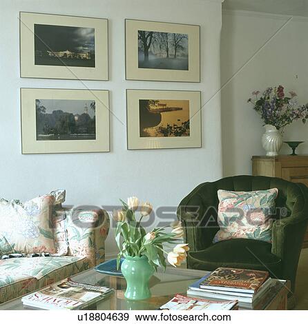 Pictures on wall in traditional living room View Large Photo Image Stock Photo - Pictures on wall in traditional living room. Fotosearch