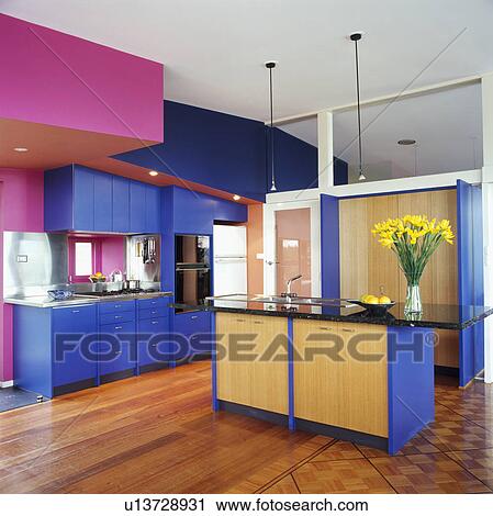 Pink and blue openplan modern kitchen with island unit View Large Photo Image Stock Image - Pink and blue openplan modern kitchen with island unit. Fotosearch