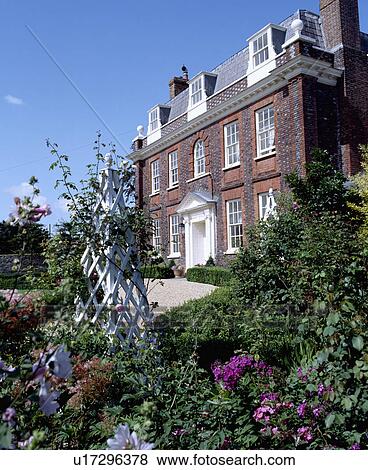 Pink roses in large garden of country house in summer View Large Photo Image Stock Photo - Pink roses in large garden of country house in summer. Fotosearch