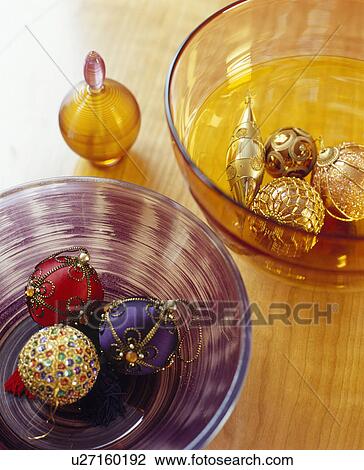 Purple red and gold Christmas baubles in purple and yellow glass bowls View Large Photo Image Stock Image - Purple red and gold Christmas baubles in purple and yellow glass bowls. Fotosearch