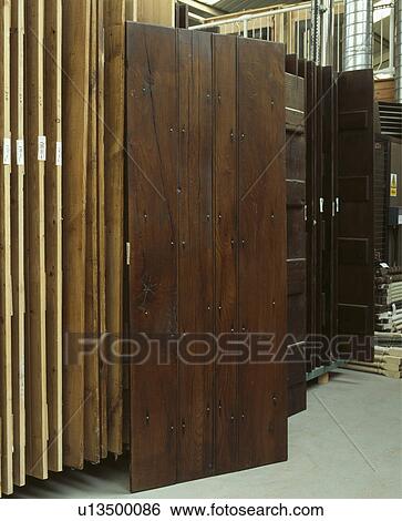 Recycling materials such as doors and windows. View Large Photo Image Stock Photograph - Recycling materials such as doors and windows.. Fotosearch