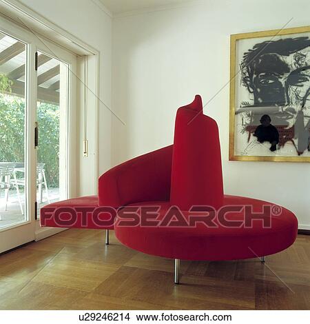 Red sofa on wooden floor in modern living room View Large Photo Image Picture - Red sofa on wooden floor in modern living room. Fotosearch