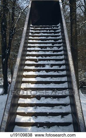 Snow on steps in garden in winter View Large Photo Image Stock Photo - Snow on steps in garden in winter. Fotosearch