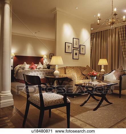 Sofa and coffee table in sitting area in modern neutral hotel suite View Large Photo Image Stock Image - Sofa and coffee table in sitting area in modern neutral hotel suite. Fotosearch