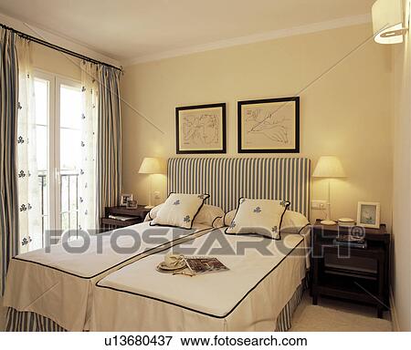Stock Photo - Spanish Styled Bedroom in the Morning.. Fotosearch