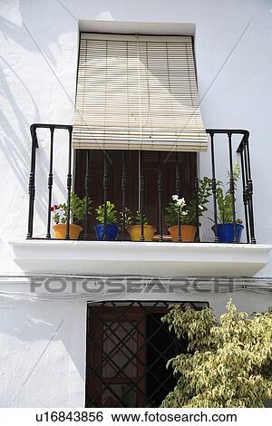 Split cane blind on balcony of traditional Spanish house View Large Photo Image Stock Photograph - Split cane blind on balcony of traditional Spanish house. Fotosearch