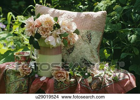 Still-life of pink roses and cushion View Large Photo Image Picture - Still-life of pink roses and cushion. Fotosearch