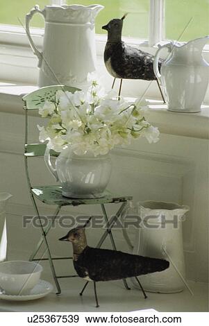 Still-Life of white sweetpeas and jugs View Large Photo Image Stock Photo - Still-Life of white sweetpeas and jugs. Fotosearch