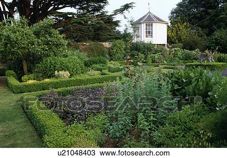 Summerhouse in large formal country garden in summer View Large Photo Image Stock Image - Summerhouse in large formal country garden in summer. Fotosearch