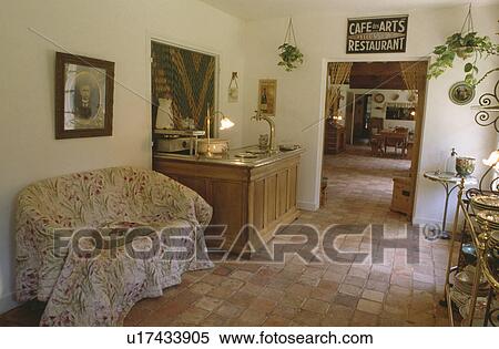 Throw on sofa in traditional living room View Large Photo Image Stock Photography - Throw on sofa in traditional living room. Fotosearch