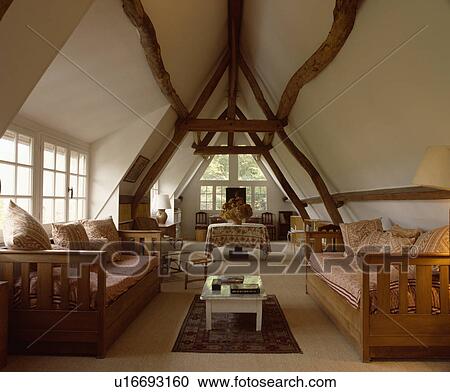 Traditional attic conversion country living room View Large Photo Image Stock Image - Traditional attic conversion country living room. Fotosearch
