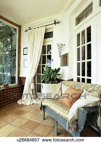 Traditional conservatory living room with comfortable furniture and green plants View Large Photo Image Stock Photo - Traditional conservatory living room with comfortable furniture and green plants. Fotosearch