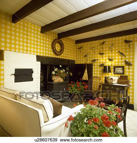 Traditional country living room with yellow+white checked fabric wall covering View Large Photo Image Stock Photo - Traditional country living room with yellow+white checked fabric wall covering. Fotosearch