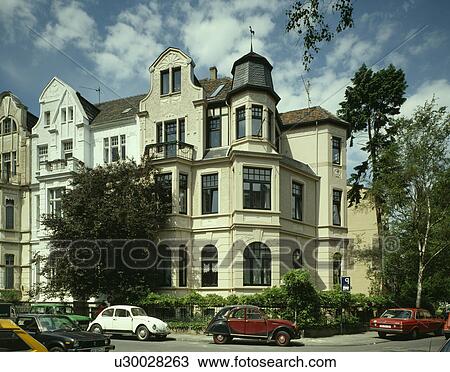 Stock Image - Traditional German townhouse with turret and Dutch gables&#13; &#10; &#13; &#10;. Fotosearch
