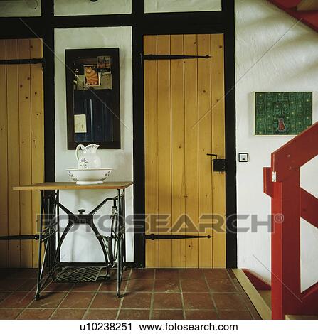 Stock Image - traditional, interior, cottage, tiles, brown, wood, interiors. Fotosearch