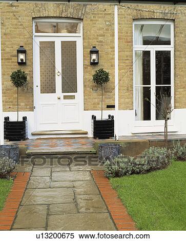 Traditional Victorian house with paved path View Large Photo Image Stock Photography - Traditional Victorian house with paved path. Fotosearch