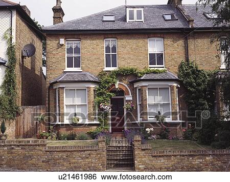 Stock Photograph - Traditional Victorian semi-detached town house. Fotosearch