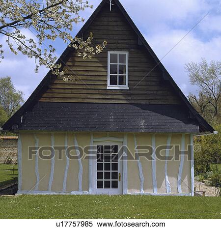 Traditional white and cream timbered country cottage in France View Large Photo Image Stock Photography - Traditional white and cream timbered country cottage in France. Fotosearch