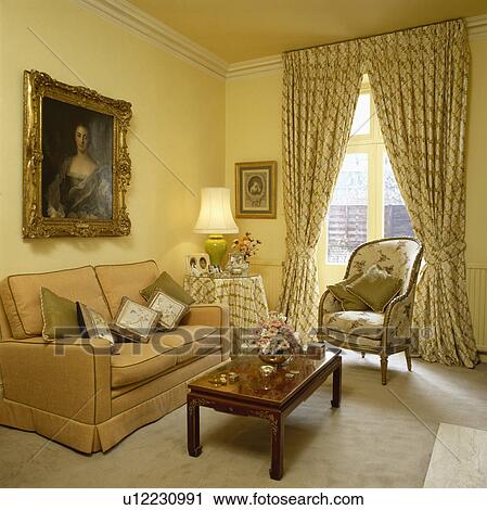 Traditional Yellow Living Room With Patterned Curtains And